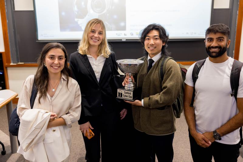 Cyber Cup Graduate Winning Team with Trophy