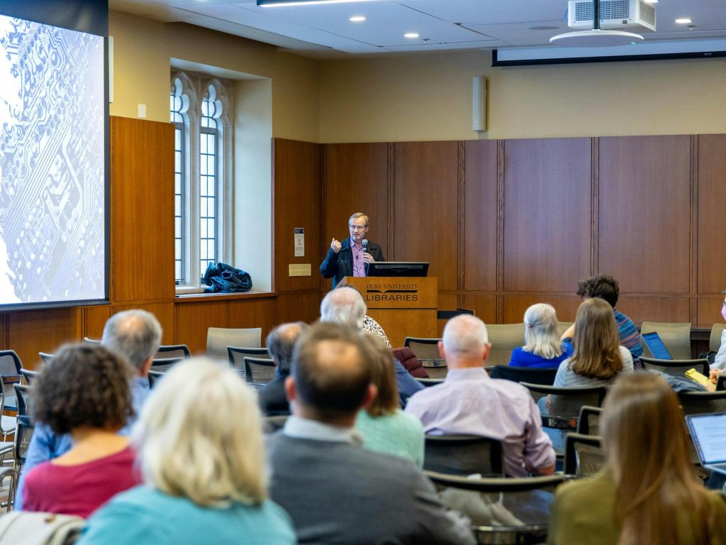 Professor Ken Rogerson speaking to faculty